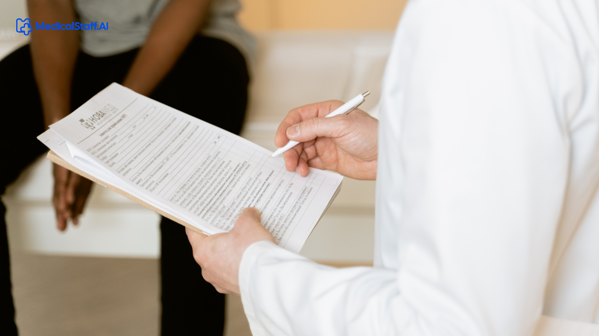 New graduate nurse reviewing healthcare documents at a desk